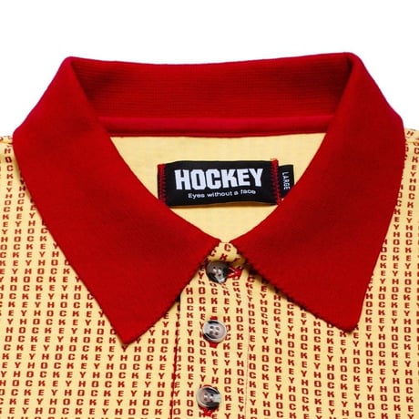 HOCKEY ALLOVER L/S POLO-GOLD