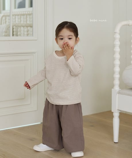 即納bebe nine flare Pants