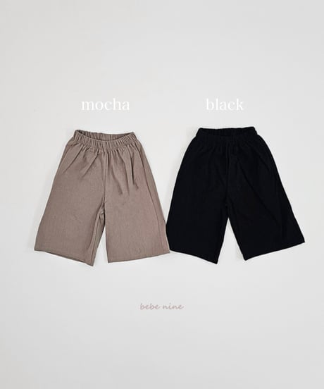 即納bebe nine flare Pants