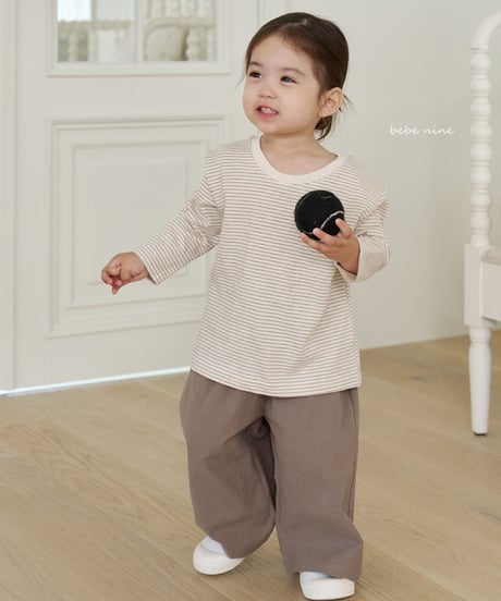 即納bebe nine flare Pants