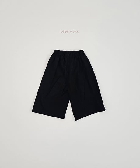 即納bebe nine flare Pants