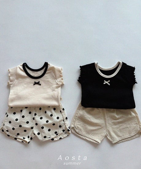 即納aosta Lip ribbon tee