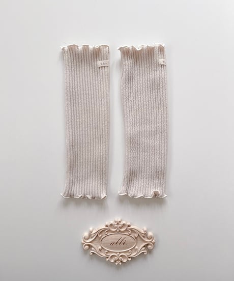 即納The beige knit warmer