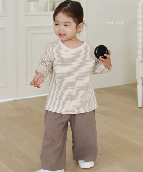 即納bebe nine flare Pants