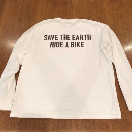 A girl rides a bike with lemon for the earth T-SHIRT