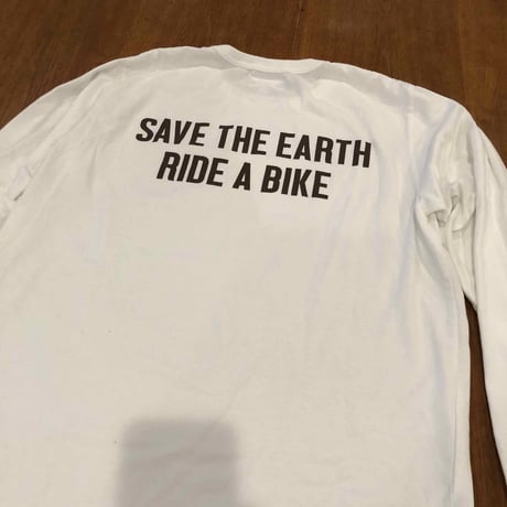 A girl rides a bike with lemon for the earth T-SHIRT
