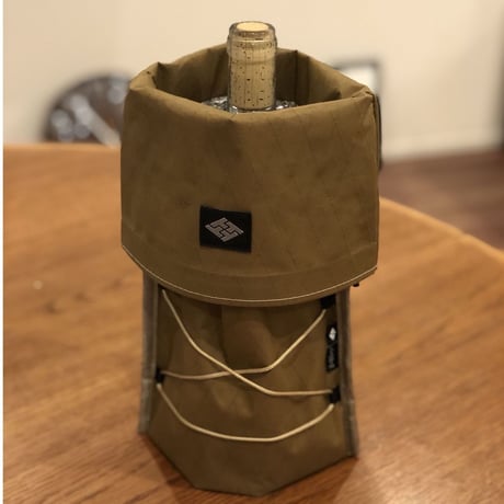 Mos Cantina Bottle. SAND