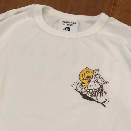 A girl rides a bike with lemon for the earth T-SHIRT