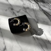 combination twist hoop pierce
