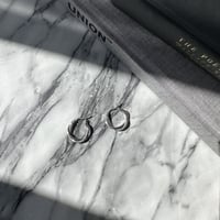 twist design hoop pierce _ silver
