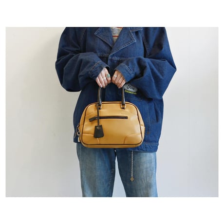 Vintage “PRADA” Leather Handbag With Clochette