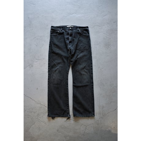 “Levi's 517” Damaged Black Boot Cut Jeans