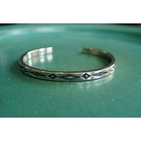 DIAMOND STAMP BANGLE