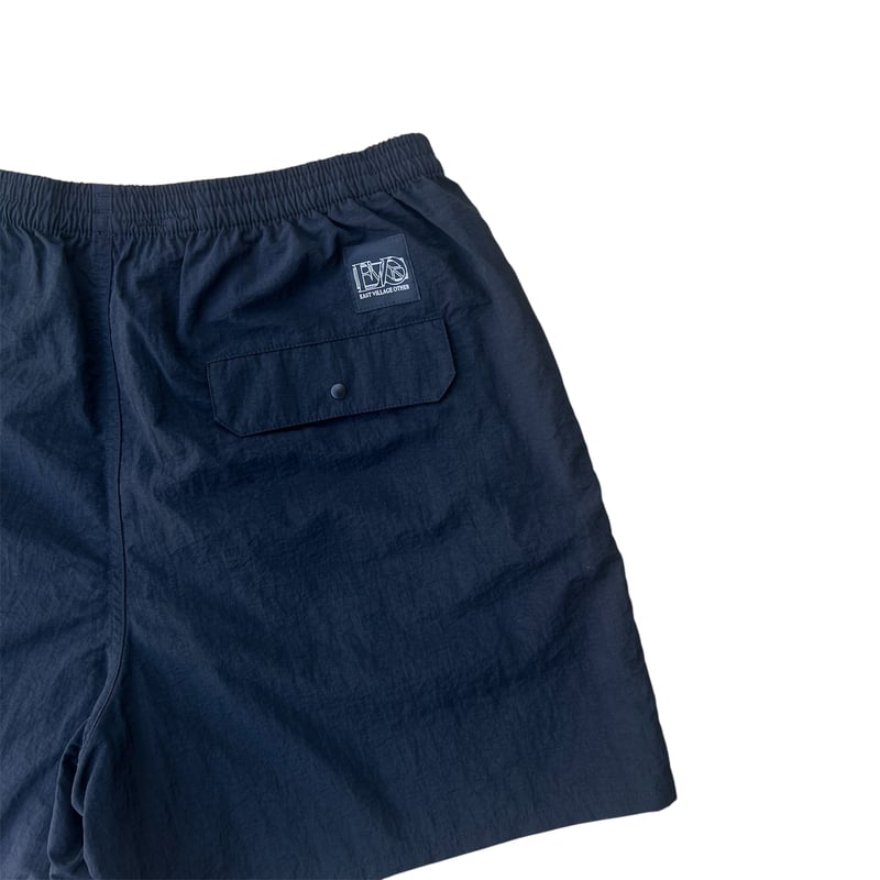 E.V.O - NYLON SHORTS (ロゴ刺繍) | east village OTHER