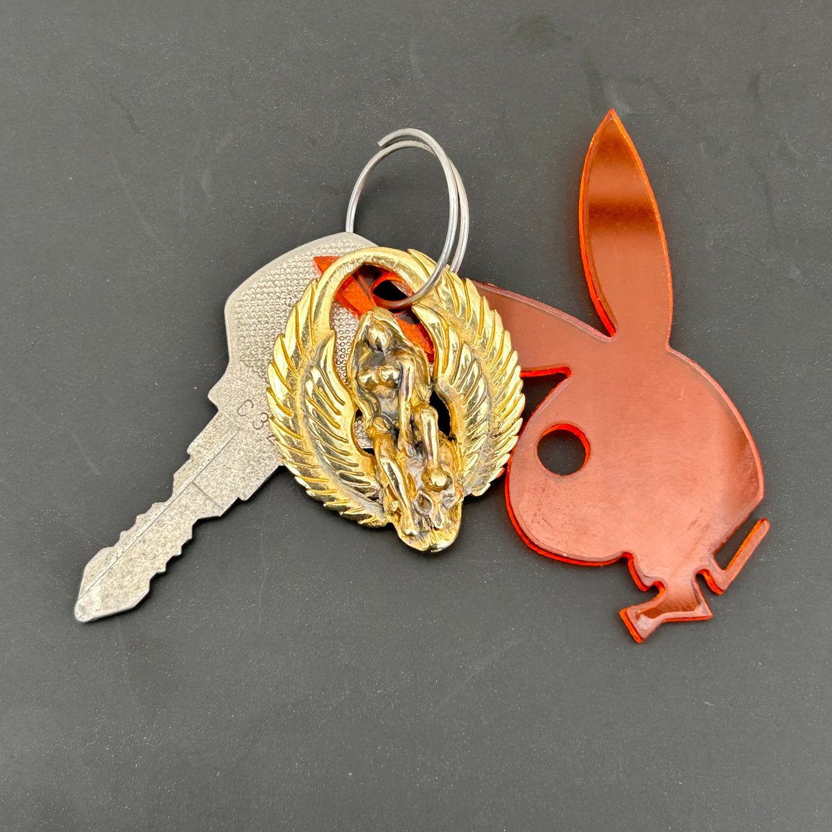 SKULL WING KEYRING | east village OTHER