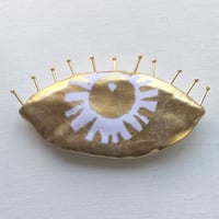 箔ブローチ 目 ホワイト