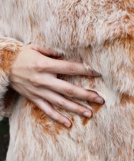 weird orange rabbit fur jacket made in china
