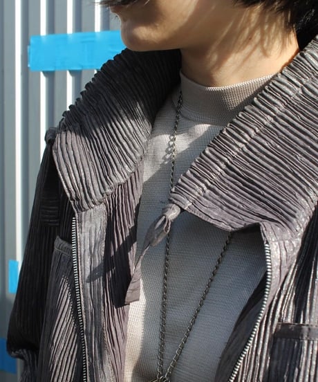 like a MATRIX pleats coat made in unknown maybe 🇰🇷