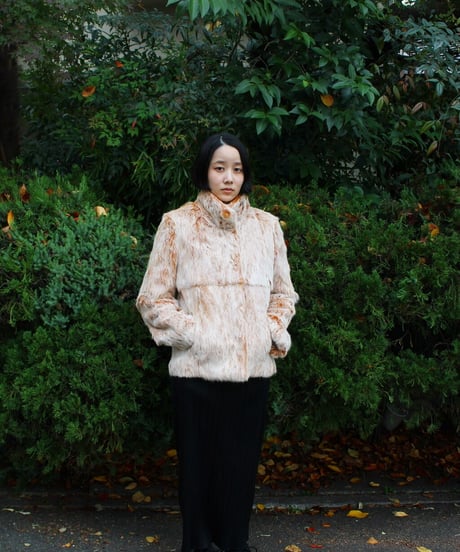 weird orange rabbit fur jacket made in china