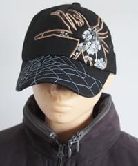 late00s 🕷️🌐🌸🕸️ tracker cap made in china