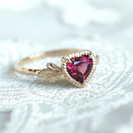 admired heart garnet ring