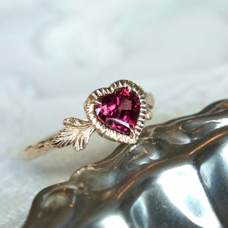admired heart garnet ring