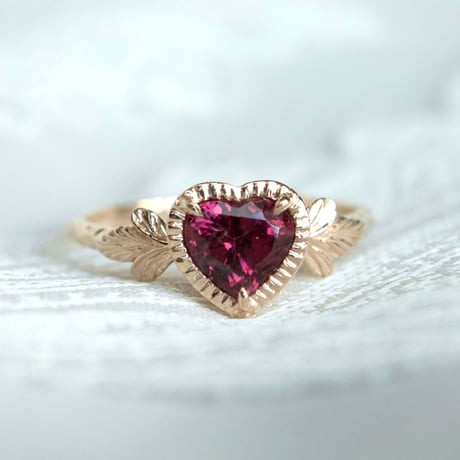 admired heart garnet ring