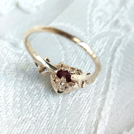 admired heart garnet ring