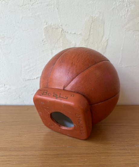 バスケットボールみたいなアメフト貯金箱
