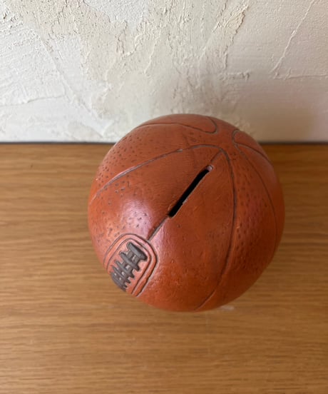 バスケットボールみたいなアメフト貯金箱