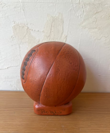 バスケットボールみたいなアメフト貯金箱