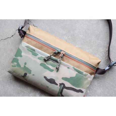 TRAIL SACOCHE (col/Coyote-camo)