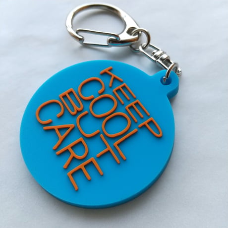 DONATION (寄付3,000円)→キーホルダー：KEEP COOL BUT CARE（コバルト×オレンジ）