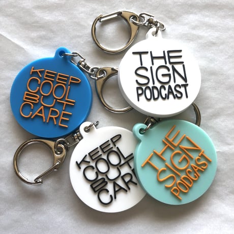 DONATION (寄付3,000円)→キーホルダー：KEEP COOL BUT CARE（コバルト×オレンジ）