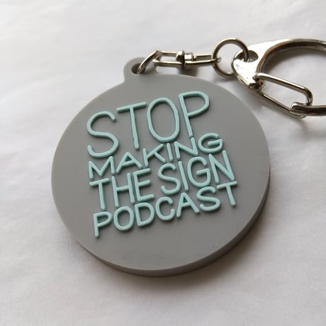 DONATION (寄付3,000円)→キーホルダー：STOP MAKING THE SIGN PODCAST（グレー×ホリゾンブルー）