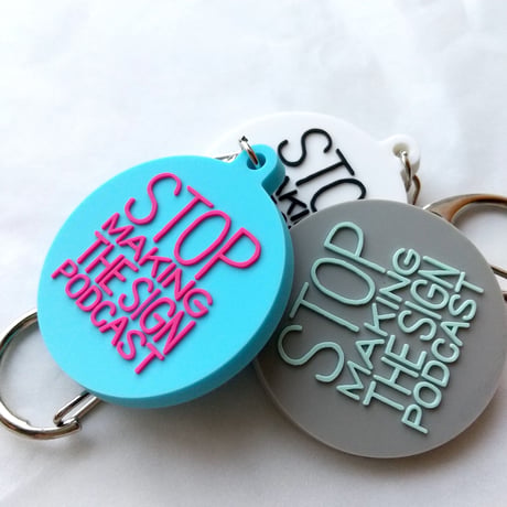 DONATION (寄付3,000円)→キーホルダー：STOP MAKING THE SIGN PODCAST（シアンブルー×マゼンタピンク）