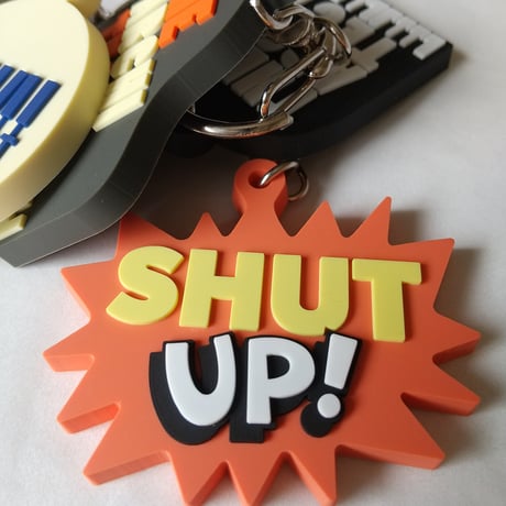 DONATION（寄付3,000円）→キーホルダー：SHUT UP!（オレンジ）