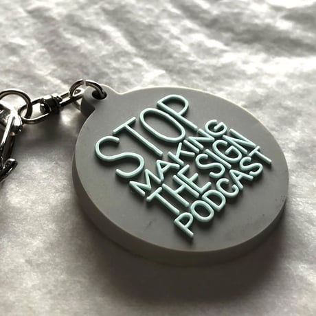 DONATION (寄付3,000円)→キーホルダー：STOP MAKING THE SIGN PODCAST（グレー×ホリゾンブルー）