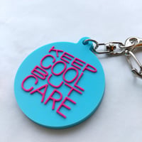 DONATION (寄付3,000円)→キーホルダー：KEEP COOL BUT CARE（シアンブルー×マゼンタピンク）