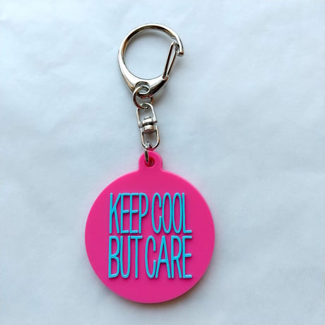 DONATION (寄付3,000円)→キーホルダー：KEEP COOL BUT CARE ver.2（マゼンタピンク×シアンブルー）