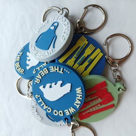 DONATION（寄付3,000円）→キーホルダー WHAT WE DO CALL？：エプロン