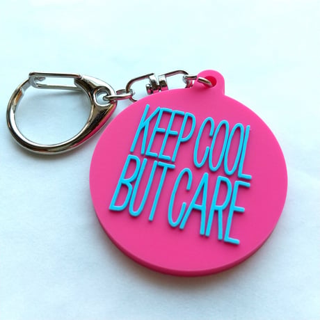 DONATION (寄付3,000円)→キーホルダー：KEEP COOL BUT CARE ver.2（マゼンタピンク×シアンブルー）