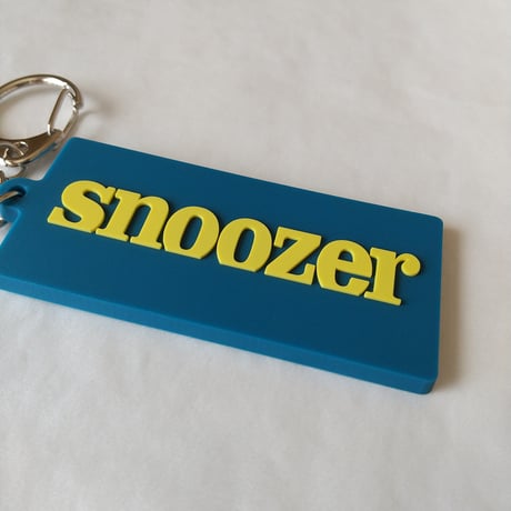 DONATION (寄付3,000円)→キーホルダー：SNOOZER（ジョンブリアンイエロー×マリンブルー）