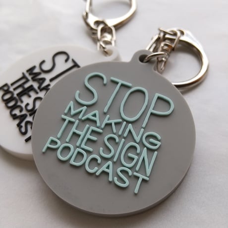 DONATION (寄付3,000円)→キーホルダー：STOP MAKING THE SIGN PODCAST（グレー×ホリゾンブルー）