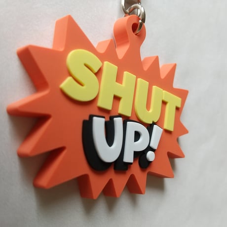 DONATION（寄付3,000円）→キーホルダー：SHUT UP!（オレンジ）