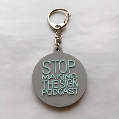 DONATION (寄付3,000円)→キーホルダー：STOP MAKING THE SIGN PODCAST（グレー×ホリゾンブルー）