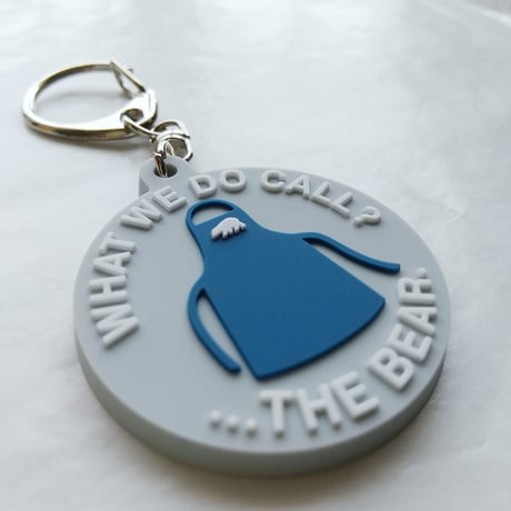 DONATION（寄付3,000円）→キーホルダー WHAT WE DO CALL？：エプロン