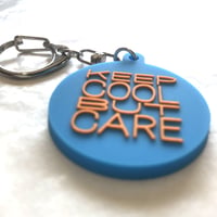 DONATION (寄付3,000円)→キーホルダー：KEEP COOL BUT CARE（コバルト×オレンジ）