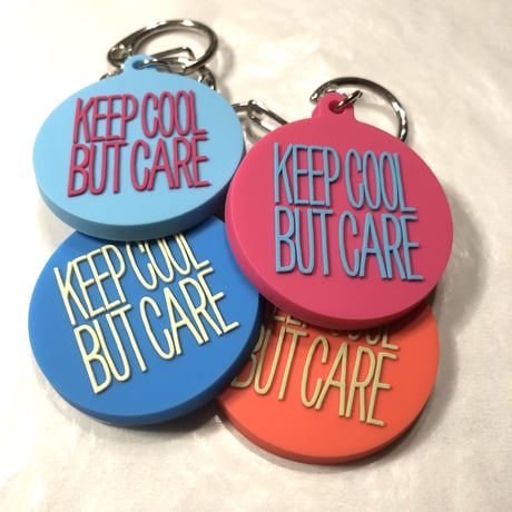 DONATION (寄付3,000円)→キーホルダー：KEEP COOL BUT CARE ver.2（マゼンタピンク×シアンブルー）