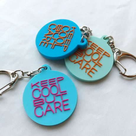 DONATION (寄付3,000円)→キーホルダー：KEEP COOL BUT CARE（シアンブルー×マゼンタピンク）